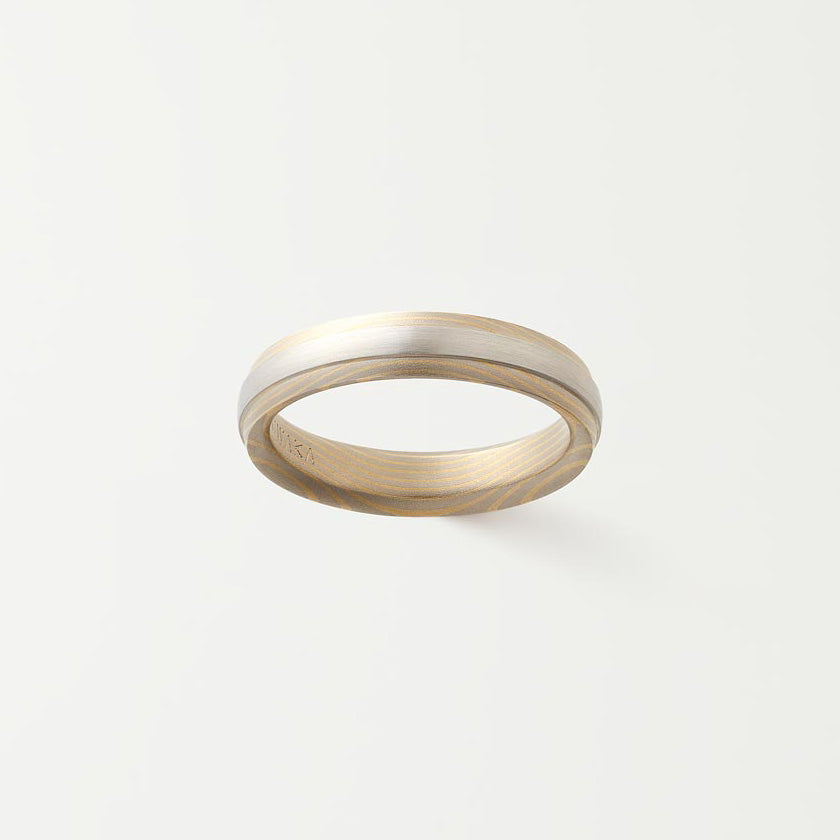 Metals: Platinum (center of exterior), White Gold & Yellow Gold (other)