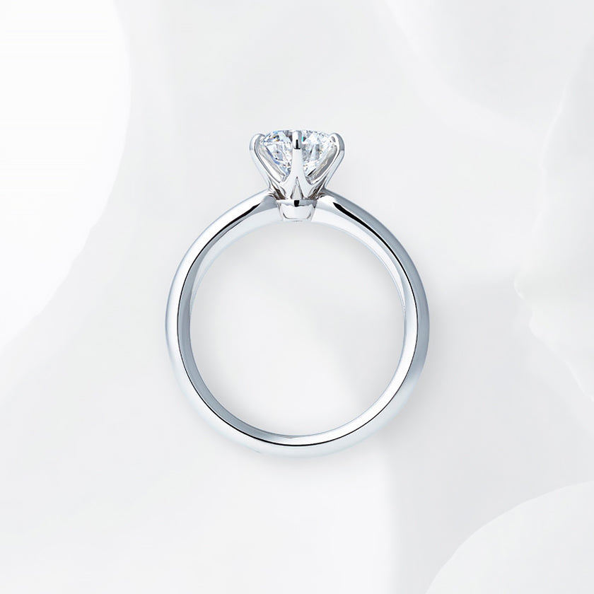 Shown with a 1.09 ct sample diamond.