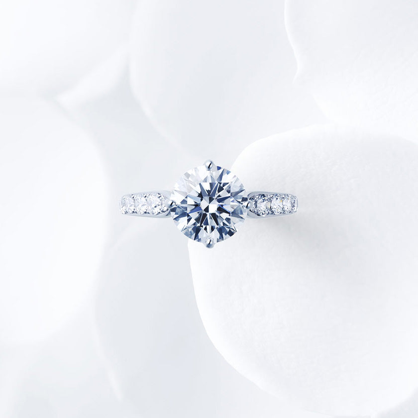 Shown with a 2.11 ct sample diamond.