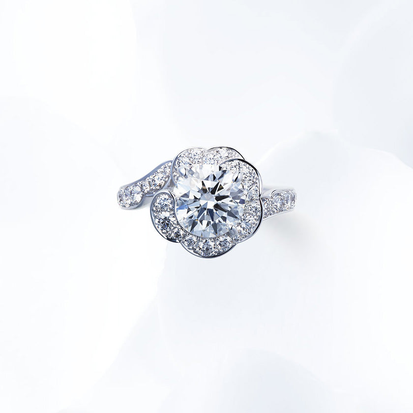 Shown with a 2.03 ct sample diamond.