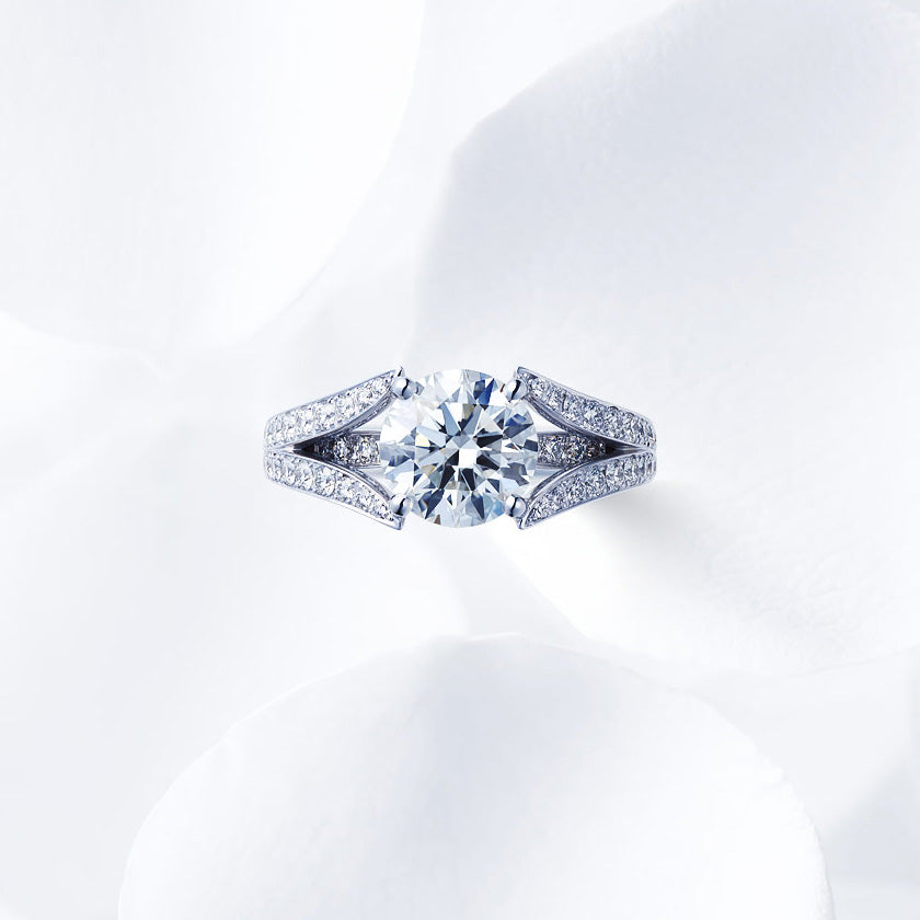 Shown with a 2.03 ct sample diamond.