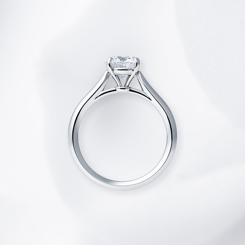 Shown with a 1.21 ct sample diamond.