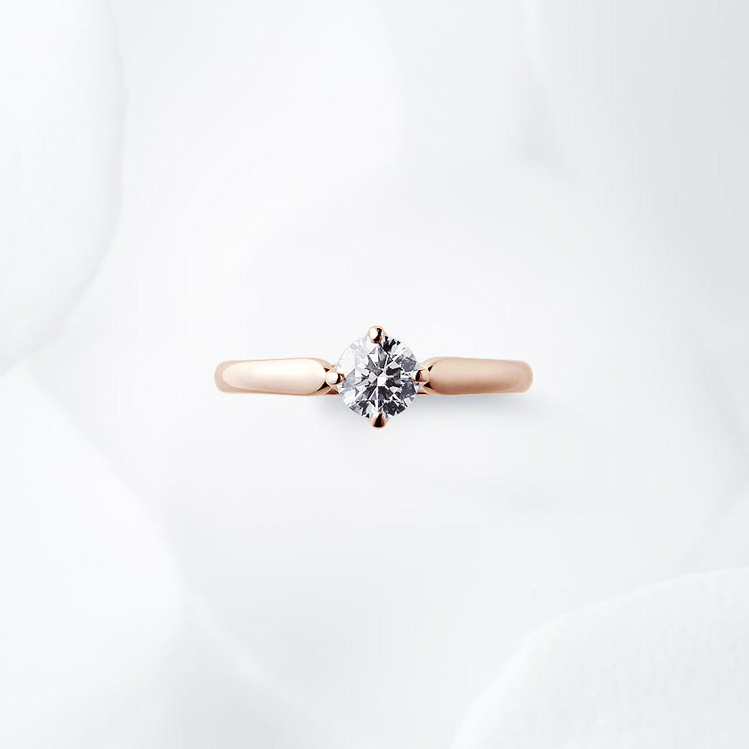 Shown with a 0.51 ct sample diamond.