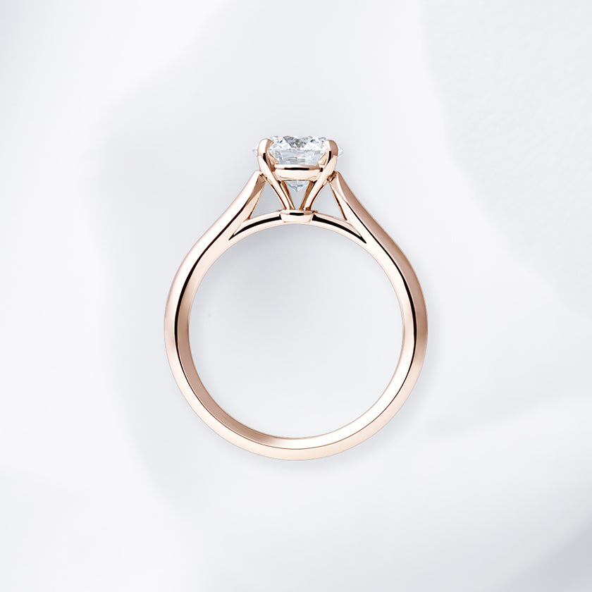 Shown with a 1.21 ct sample diamond.