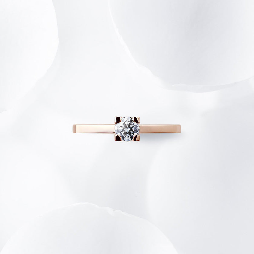 Shown with a 0.33 ct sample diamond.