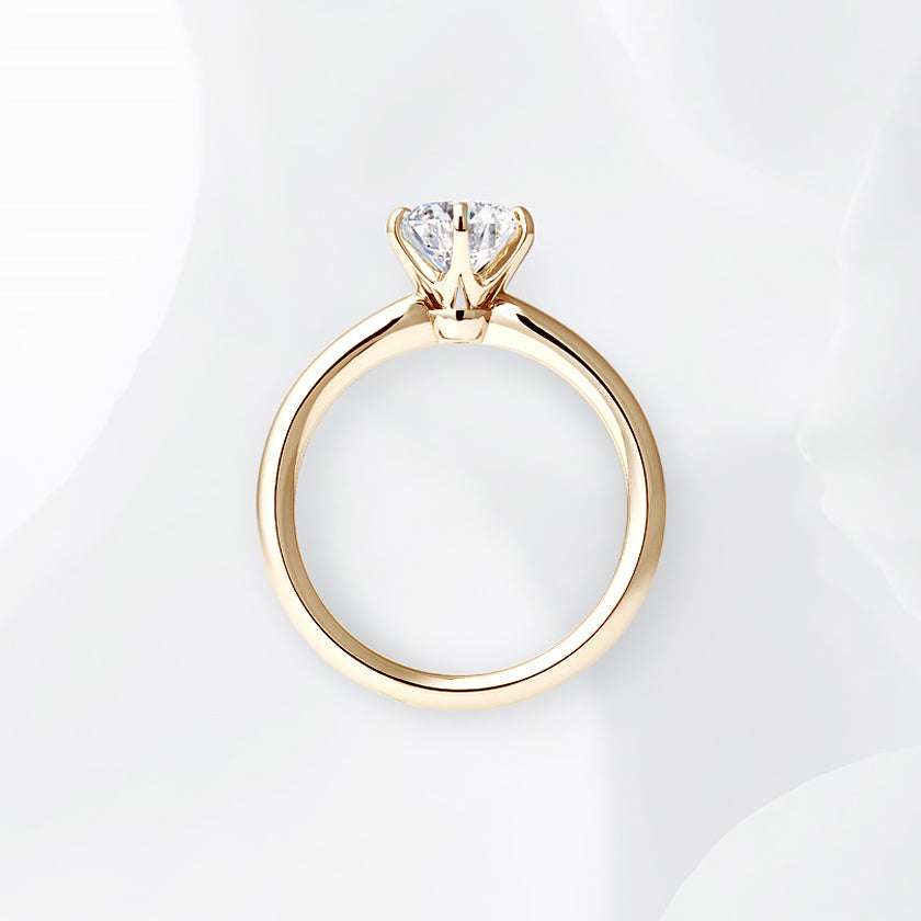 Shown with a 1.09 ct sample diamond.