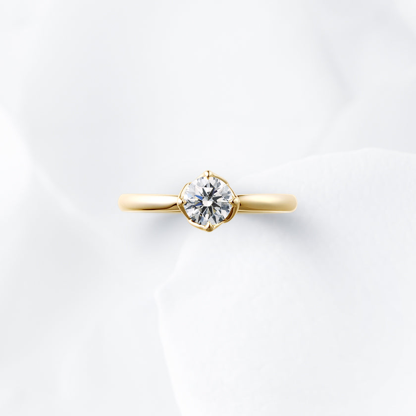 Shown with a 0.54 ct sample diamond.