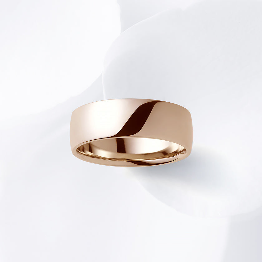 This ring design is wider than others and may fit tighter. Some customers prefer a size that is 0.5 or 1.0 larger than other designs.