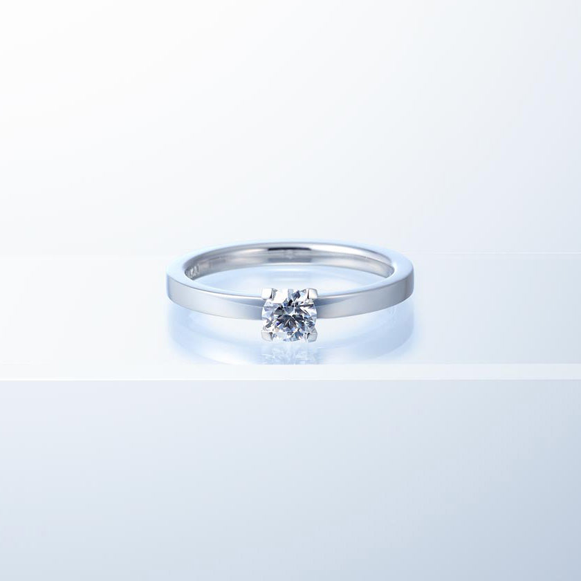 Shown with a 0.31 ct sample diamond.